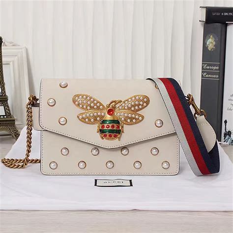 white leather gucci flat bag bumblebee|gucci shoulder bag brown.